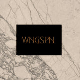 A mockup of a WNGSPN gift voucher