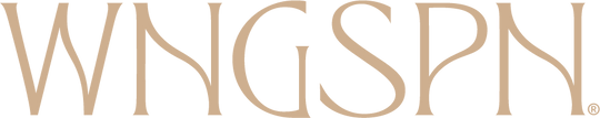 The inline WNGSPN logo in a warm cream tone. The logo is elegant and feminine with small serifs and curved diagonal lines.