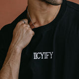 Close-up embroidery detail of the "Iicyify" relaxed fit T-shirt by WNGSPN, highlighting clean, minimalist embroidery.