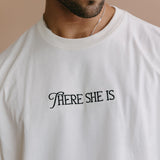 Close-up embroidery detail of the "There She Is" relaxed fit T-shirt by WNGSPN, highlighting clean, minimalist embroidery.